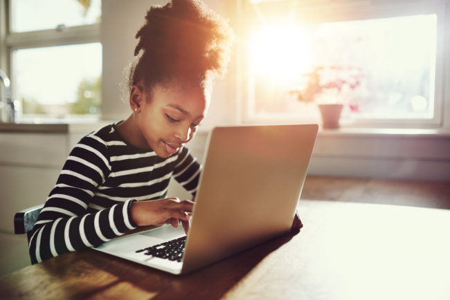 a girl using laptop