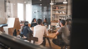 a team chatting in the office